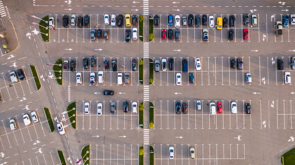 Car parking lot viewed from above, Aerial view. Top view